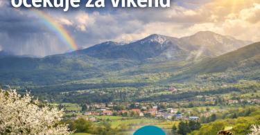 Planinska dolina s travnjacima, cvjetovima i suncem kroz oblake