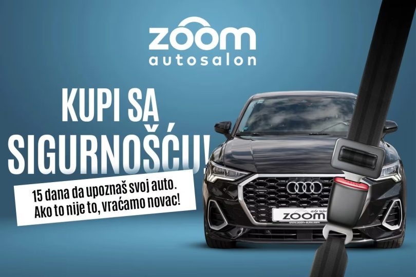 Crni Audi automobil ispred ZOOM autosalona s natpisom o 15 dana testiranja vozila